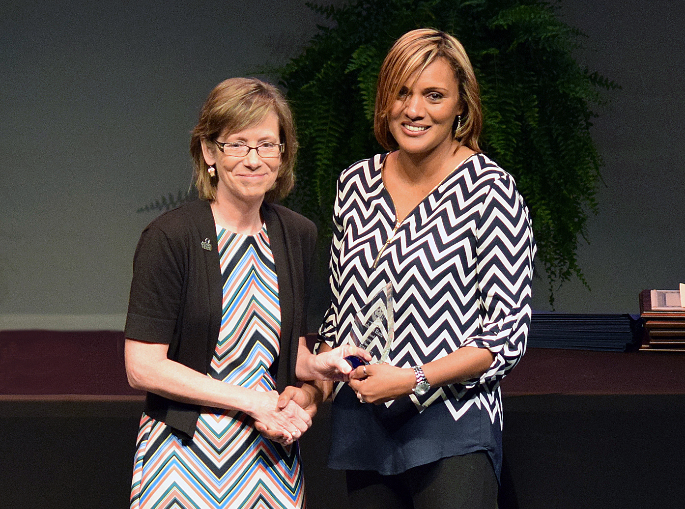 CCTC Interim President Terry Booth presents this year’s School Service Award to Rebecca Ratz at the 37th annual Awards Convocation.