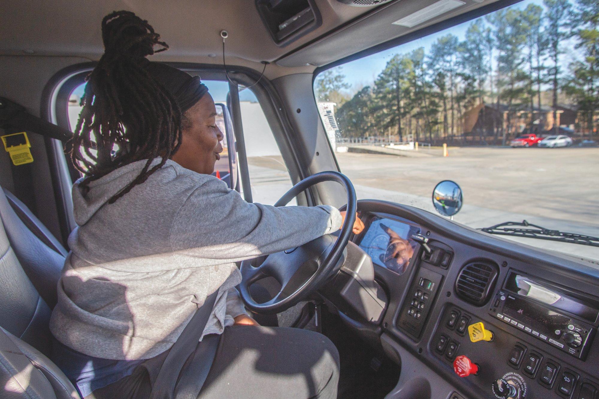 Patrina Space, a student in Central Carolina Technical College's relatively new Commercial Driver's License program, performs a pre-trip inspection on Monday. The short-term course is housed at Central Carolina's Advanced Manufacturing Technology Training Center on Broad Street. The continuing education program at the college first began in April last year.