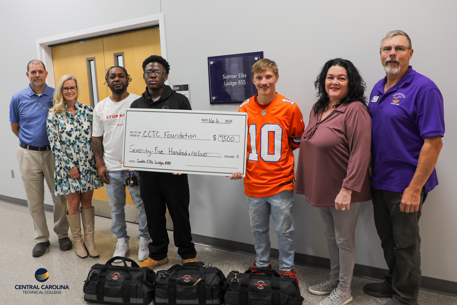 Representatives from Sumter Elks Lodge present a $7,500 check to the CCTC Foundation alongside CCTC staff and students.
