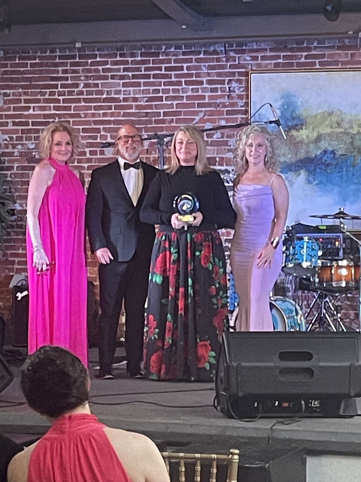 Jennifer Tyree, CCTC Biology professor, accepting an award for Collegiate Educator of the Year.